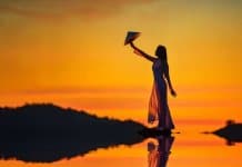 Vietnam must see- All you need to know Vietnam must see Beautiful woman with Vietnam culture traditional dress on during sunset,Vietnam